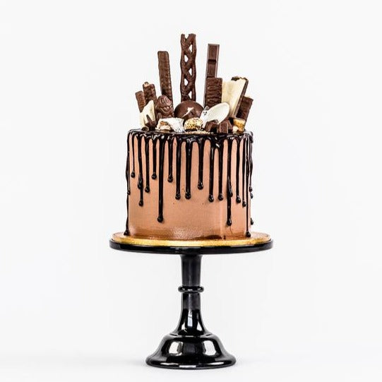 Chocolate fully loaded drip cake for birthday celebration Isle of Man