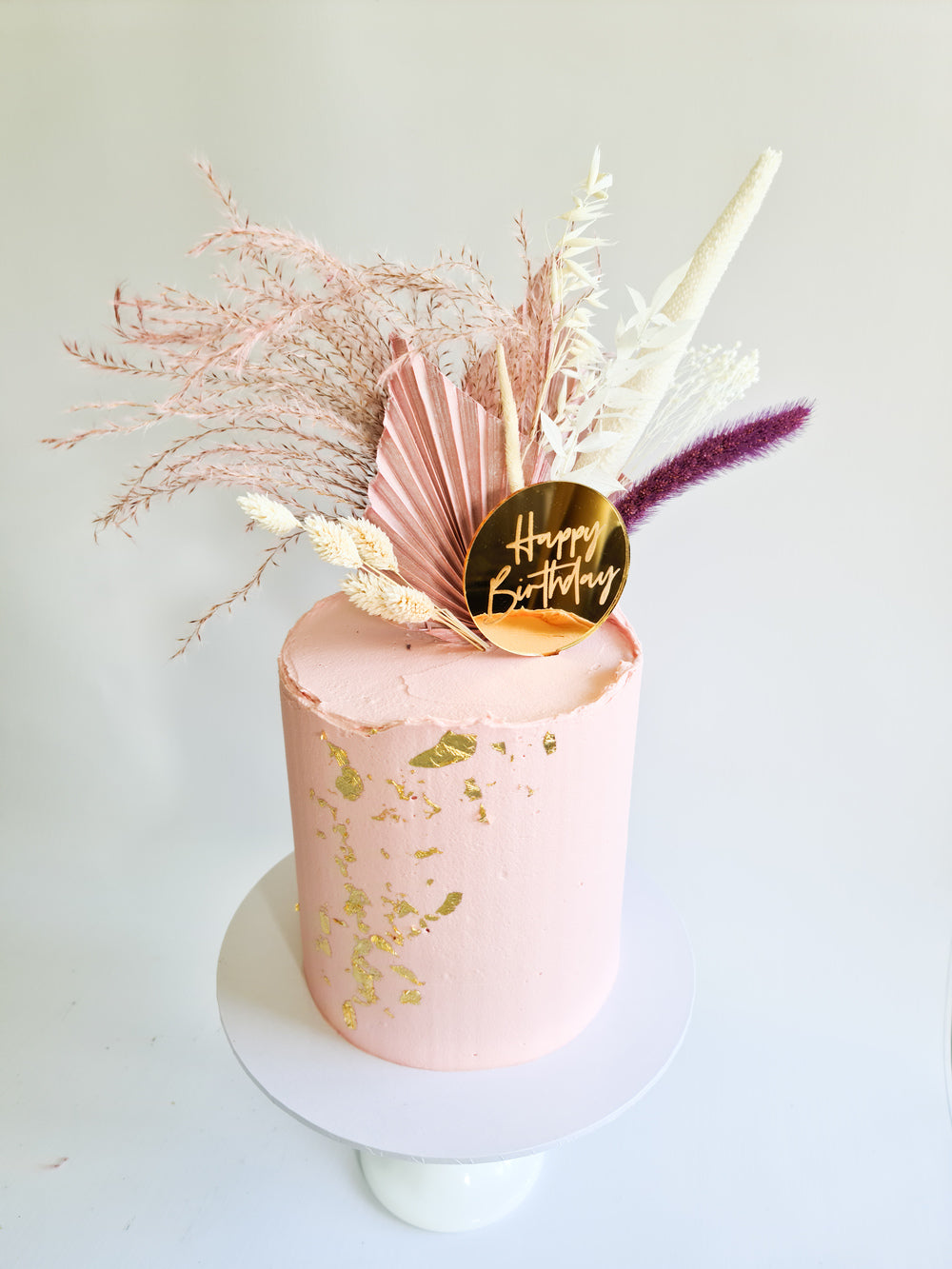 Pink dried flower birthday celebration cake Isle of Man