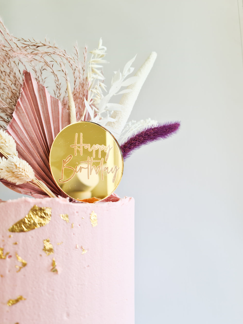 Pink dried flower birthday celebration cake Isle of Man