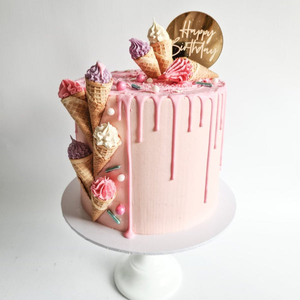 Pink mini ice cream drip birthday celebration cake Isle of Man