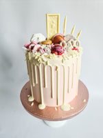 Pink fully loaded drip birthday celebration cake Isle of Man