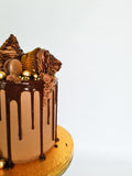 Chocolate cupcakes and macaron drip birthday celebration cake Isle of Man