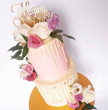 Pink fresh flower drip birthday celebration cake Isle of Man